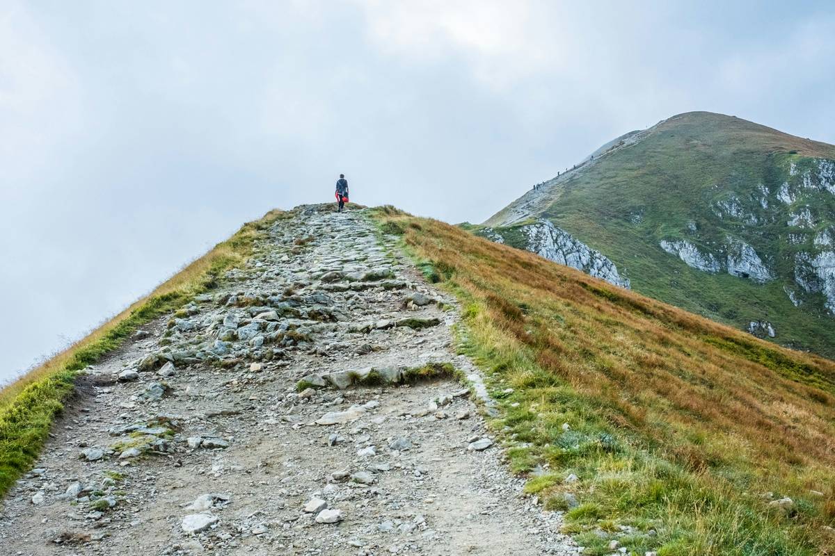 Before-and-after photo of someone who lost weight hiking
