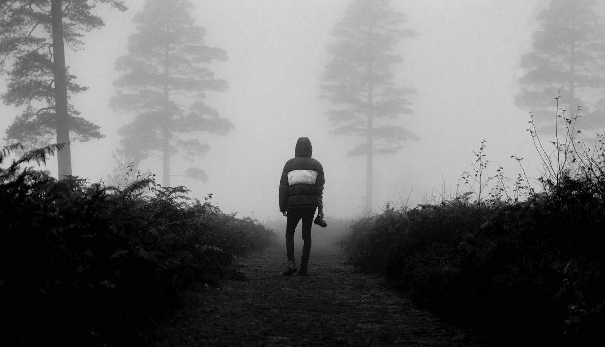 Walking into the mist.